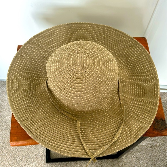 Never worn sun hat; olive/tan color with side straps. - Picture 1 of 3